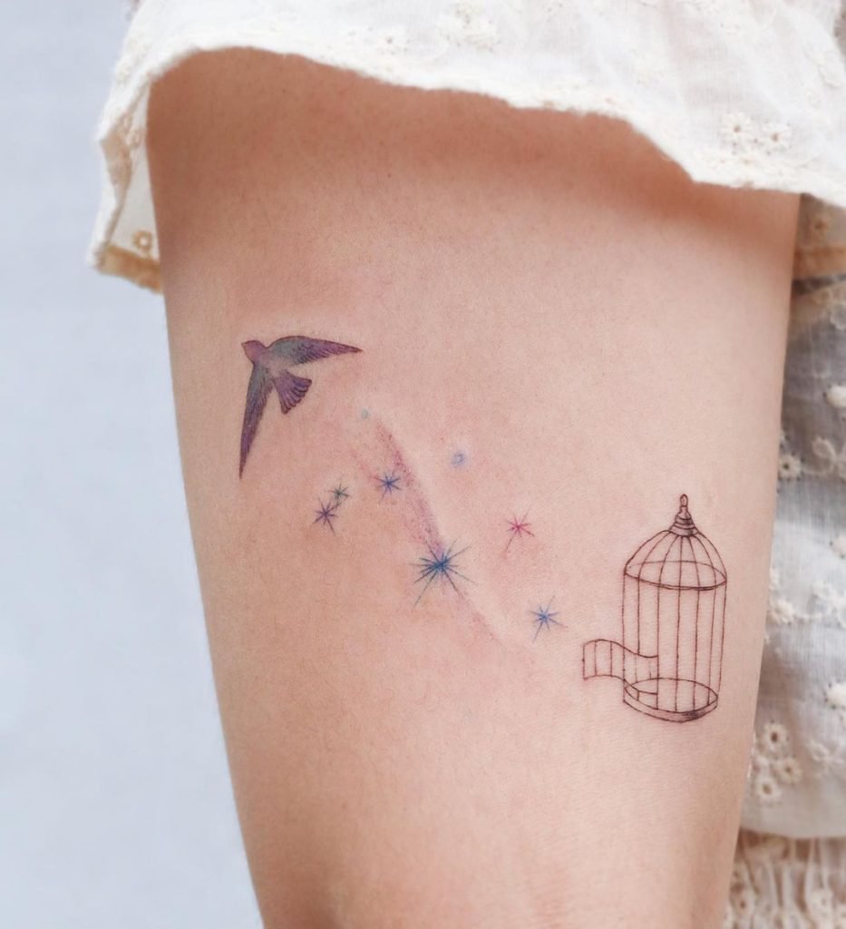 101 Most Popular Tattoo Designs and Their Meanings 4 Bird fly tatto of cage