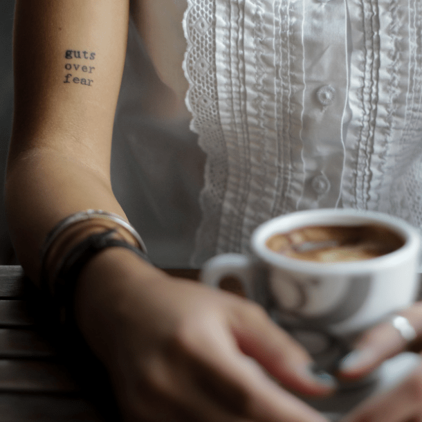 101 Most Popular Tattoo Designs and Their Meanings 34 guts over fear eminem