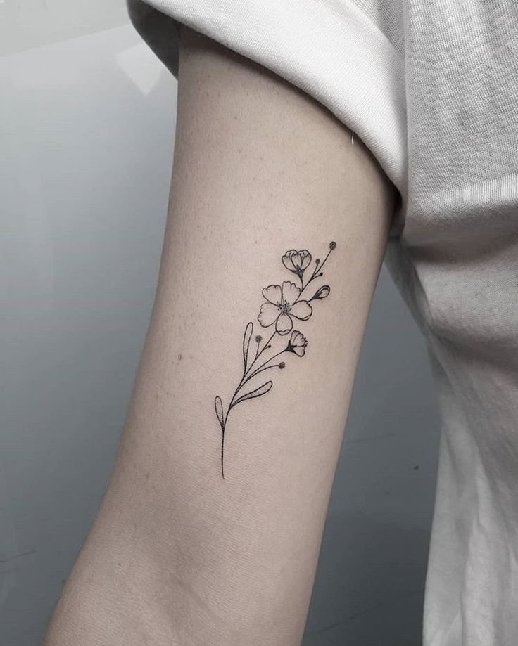 101 Most Popular Tattoo Designs and Their Meanings 13 the pretty blossom tattoo